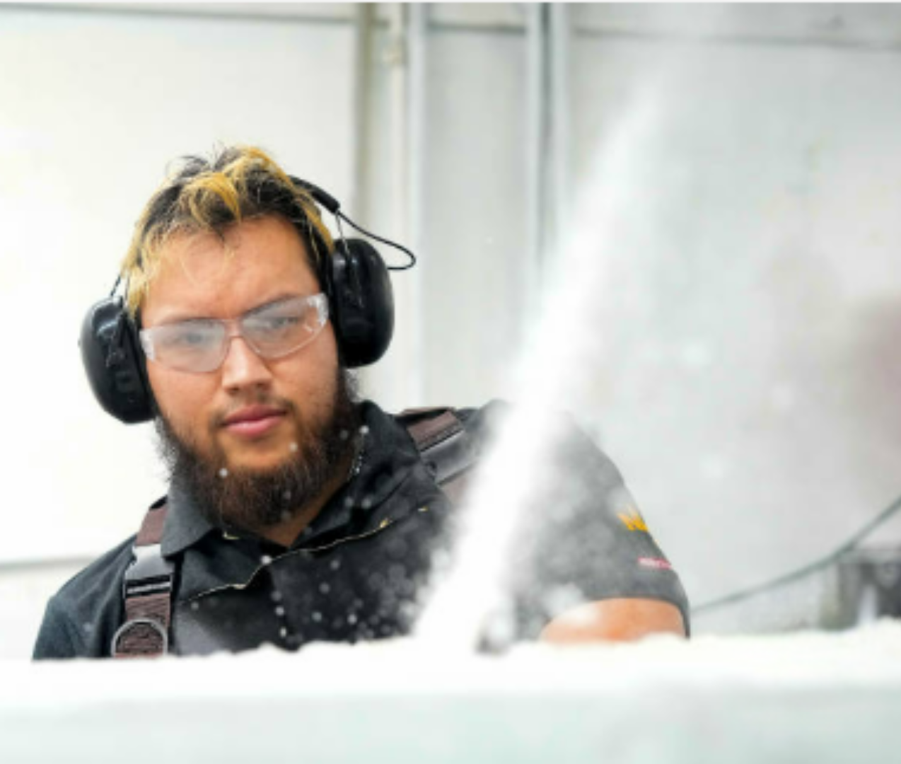 cutting blocks of ice into slabs